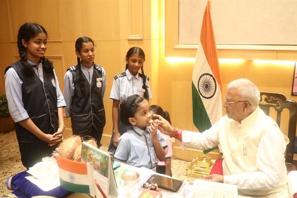 School girls tie Rakhi to Governor Shri Patel