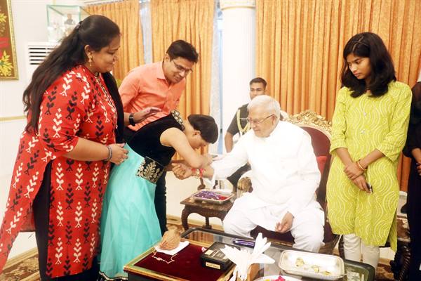 Raksha Bandhan Festival Celebrated at Raj Bhavan by Tying Rakhi to Governor Shri Patel
